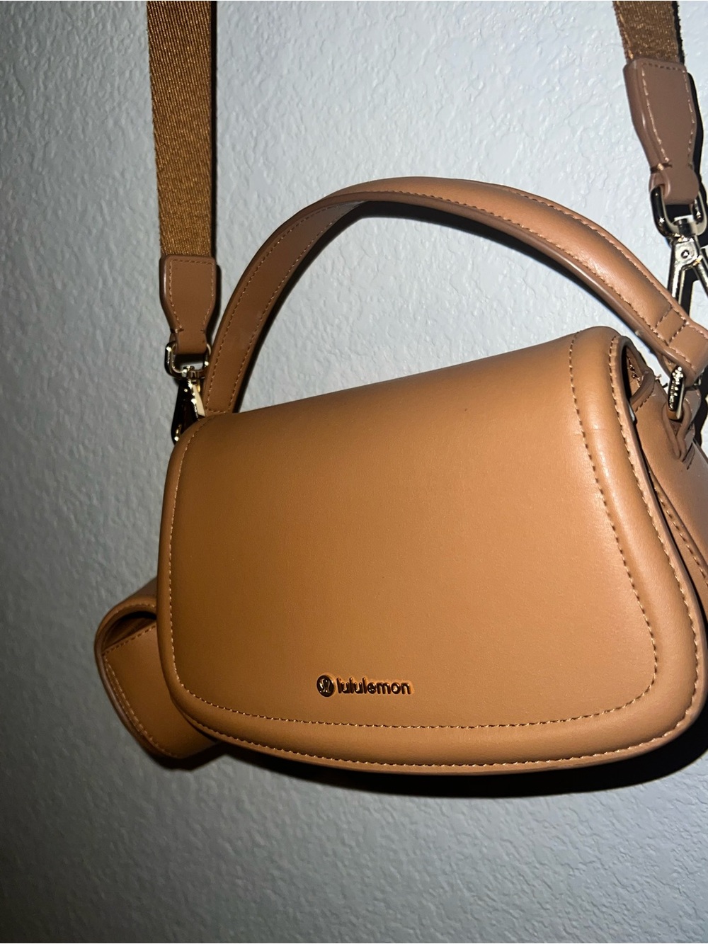 Lululemon Athletica Tan Saddle Crossbody Bag with Adjustable Strap